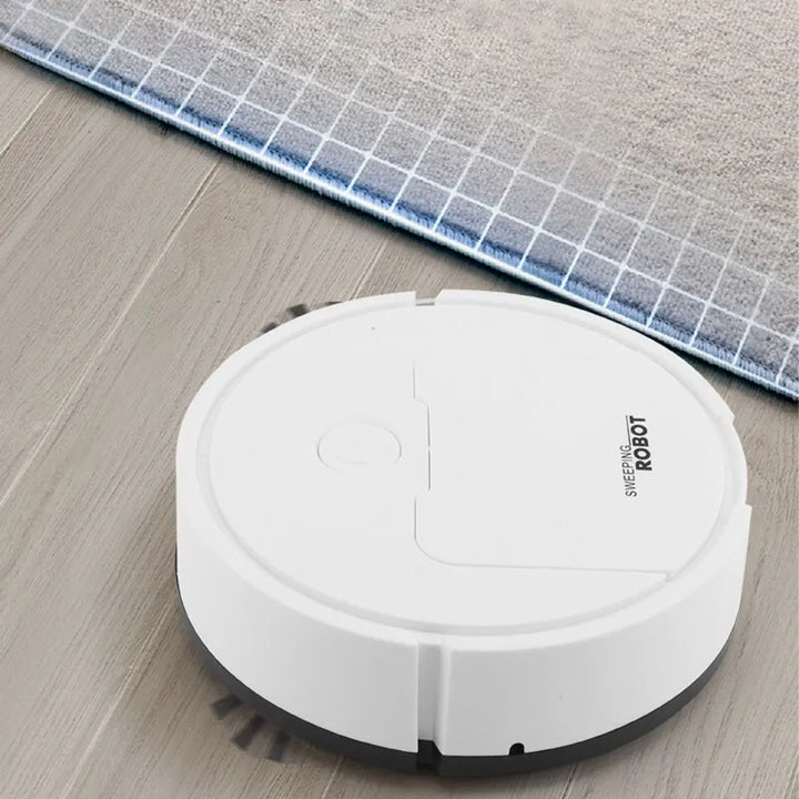 Kompakter automatischer Roboterstaubsauger, effizient für gründliche Bodenreinigung zuhause.