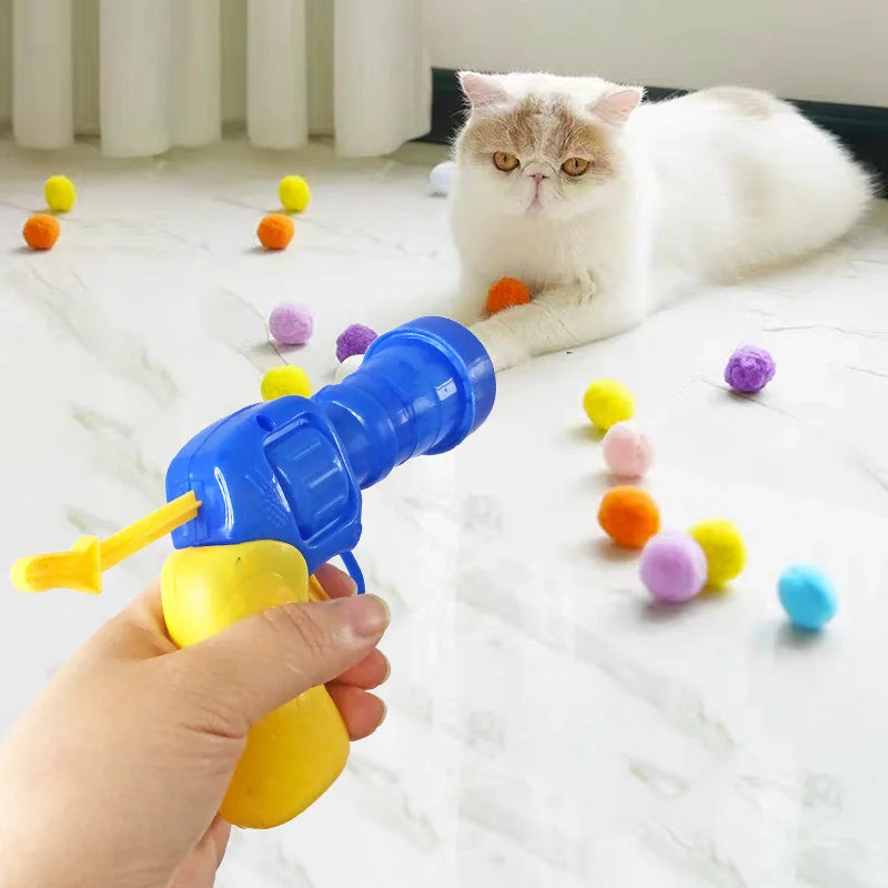 Interaktive Katzenspielzeug-Kanone aus robustem Kunststoff für aktiven Jagdspaß; fördert Spieltrieb.