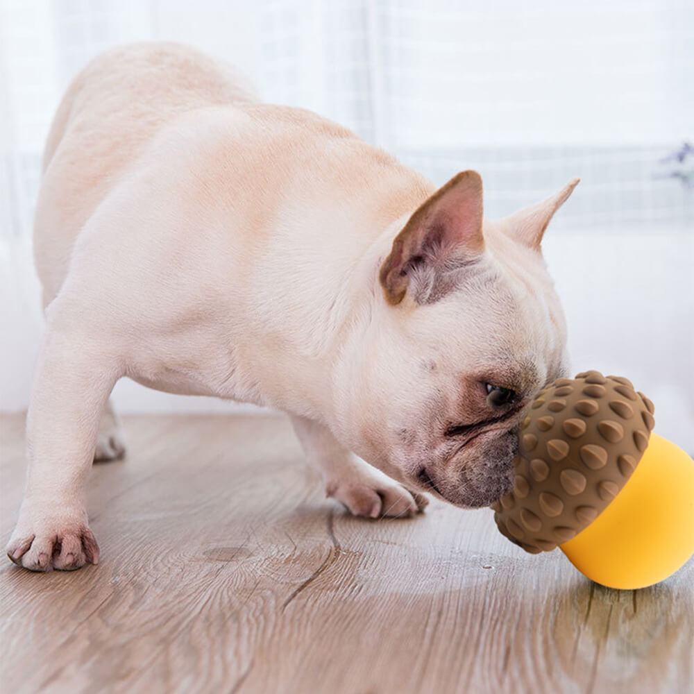 Robustes Silikon-Hundespielzeug in Tannenzapfenform; als Futterspender für Welpen & kleine Hunde.