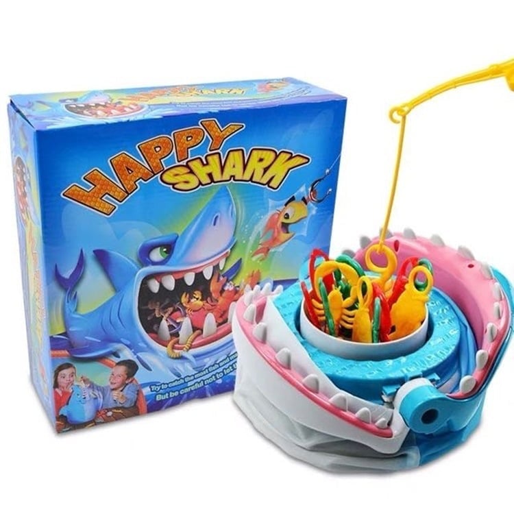 Interaktives Hai-Fangspiel mit farbigen Spielfiguren und Würfel, perfekt für Familienunterhaltung und Geschicklichkeit.
