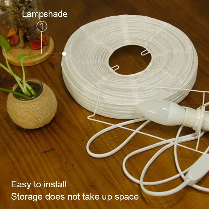 Minimalistische japanische Design-Tischlampe aus Reispapier mit integrierter LED. Perfekte Deko-Beleuchtung.