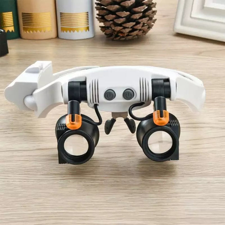 Juwelier Kopfbandlupe mit LED-Beleuchtung und austauschbaren Gläsern für präzise Arbeiten.
