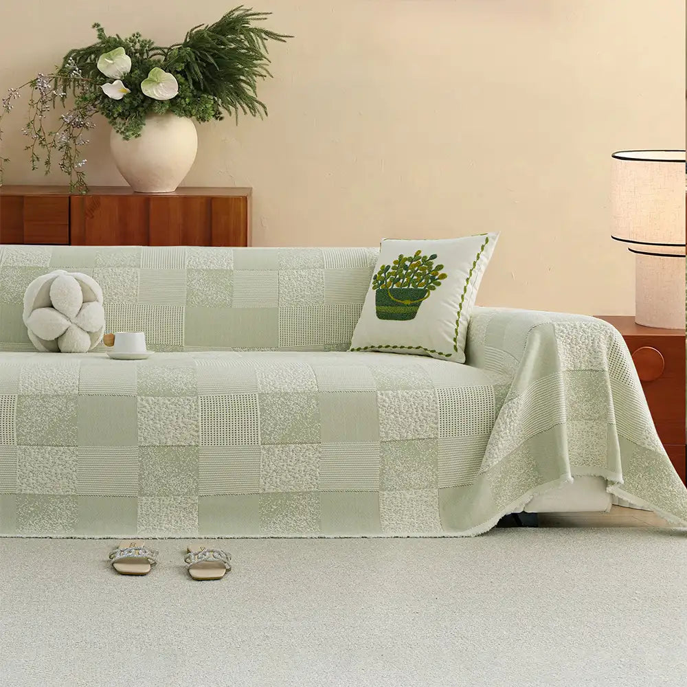 Eleganter Sofaüberwurf als stilvolle Wohndekoration und praktischer Möbelschutz. Verbessert das Ambiente Ihres Wohnzimmers.