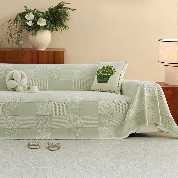 Eleganter Sofaüberwurf als stilvolle Wohndekoration und praktischer Möbelschutz. Verbessert das Ambiente Ihres Wohnzimmers.
