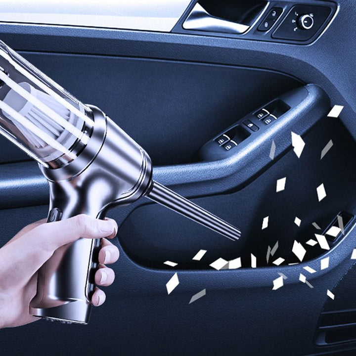 Autostaubsauger mit Gebläsefunktion in Aktion. Vielseitiger Handstaubsauger für Auto und Haushaltshilfe.