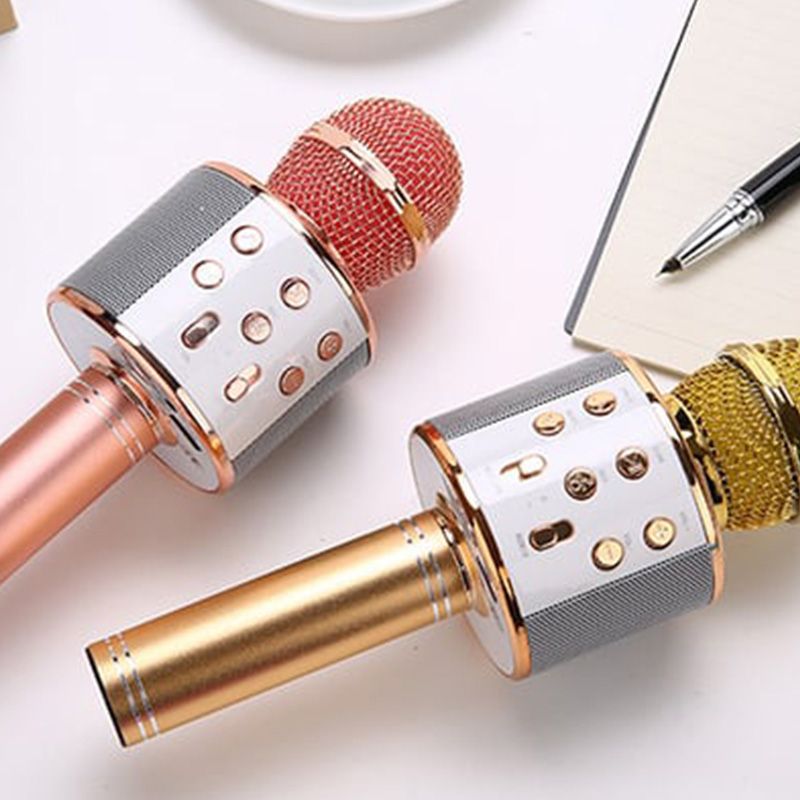 Modernes kabelloses Karaoke-Mikrofon mit Bluetooth Lautsprecher in schickem Design für besten Musik-Genuss.
