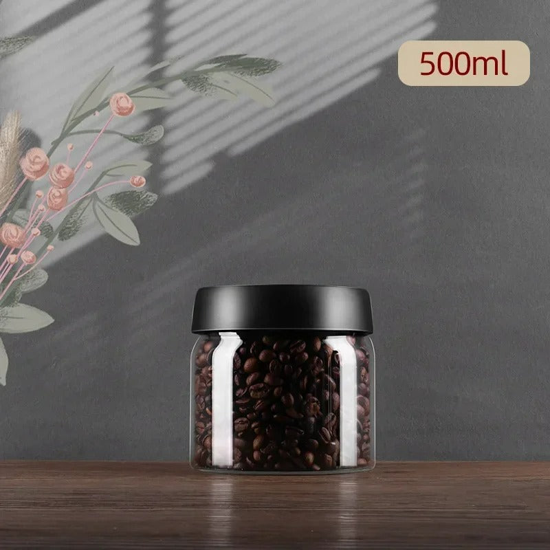 Aromasicherer Kaffeebohnenbehälter mit Vakuumfunktion aus robustem Borosilikatglas für dauerhafte Frische.