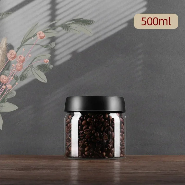 Aromasicherer Kaffeebohnenbehälter mit Vakuumfunktion aus robustem Borosilikatglas für dauerhafte Frische.
