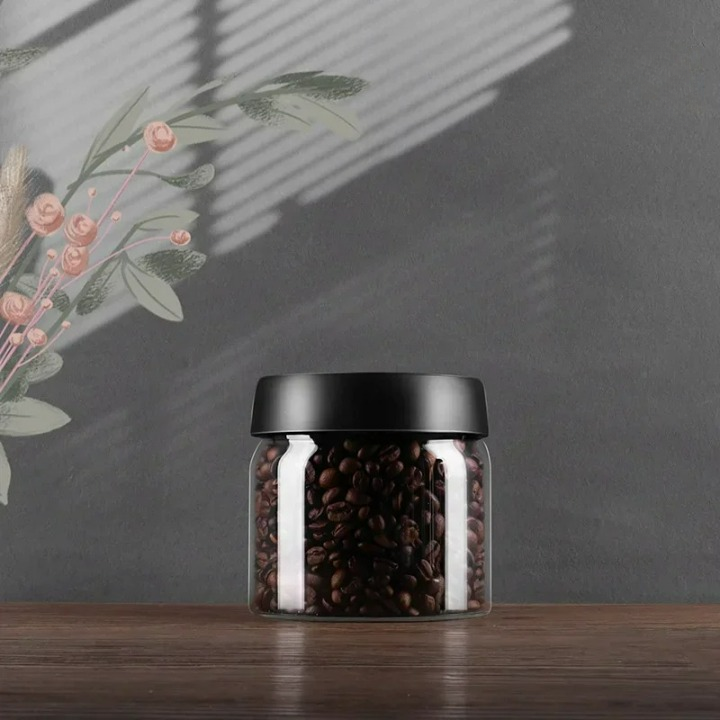 Praktischer Vakuum-Kaffeebehälter aus Glas, ideal für die langfristige Aroma-Frische von Kaffeebohnen.