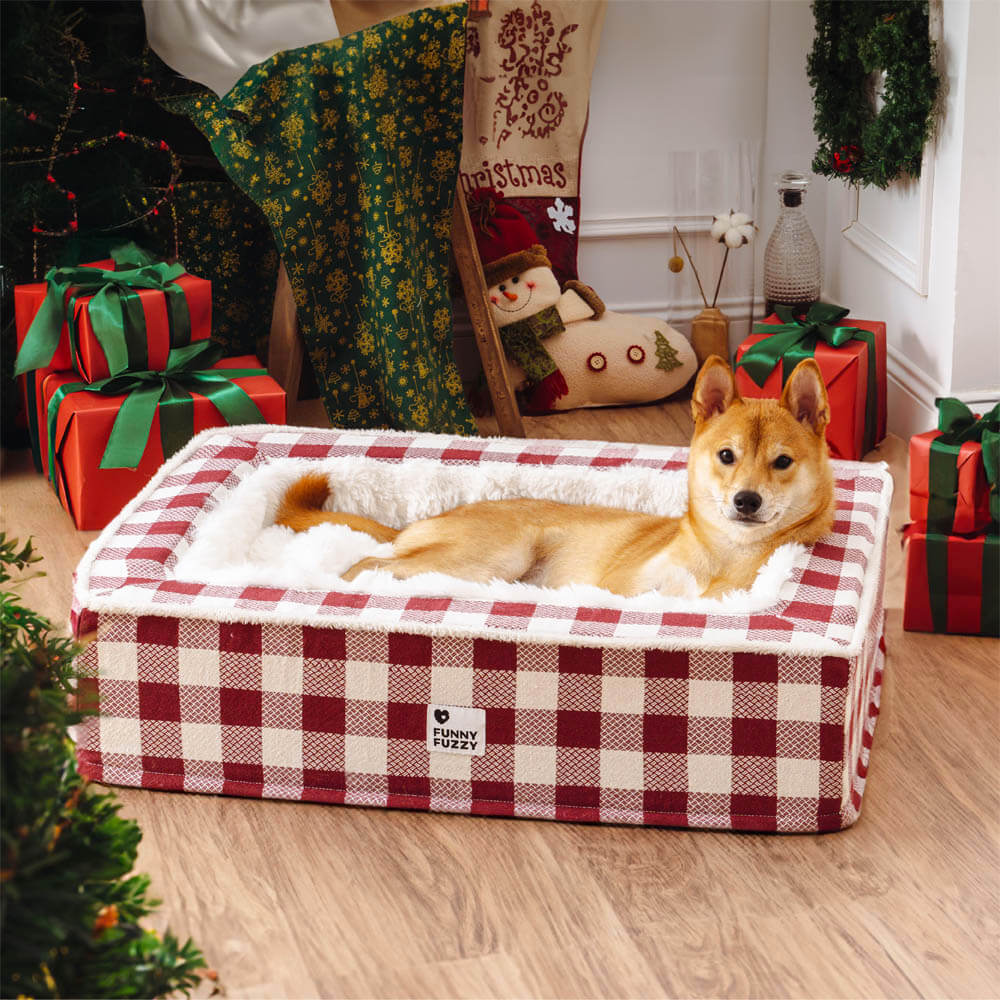 Nahaufnahme des weichen, karierten Stoffes vom orthopädischen Hundebett. Komfort für Haustiere.