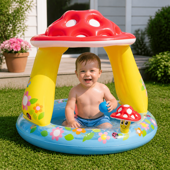 Sicheres Baby-Planschbecken mit weichem Doppelboden und Pilzdach für optimalen UV-Schutz im Sommer.