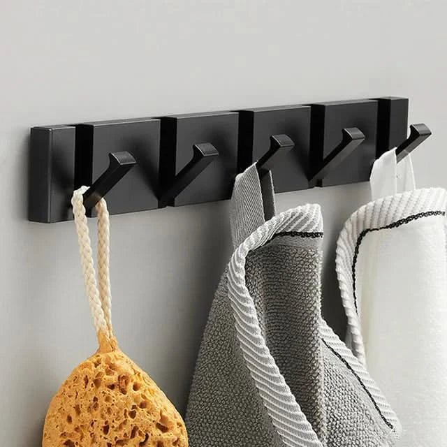 Klapphaken FOLDHOOK für Handtücher im Bad. Modern, elegant und extrem platzsparend an der Wand.