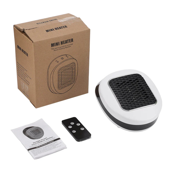 Grauer, kompakter 600W Elektro-Heizlüfter mit integriertem Thermostat, Fernbedienung und Timerfunktion.