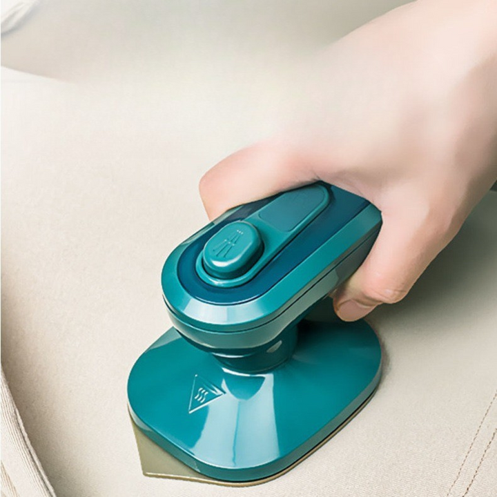 Kompaktes Mini-Dampfbügeleisen, elektrisch, ideal für faltenfreie Kleidung auf Reisen. Perfekt für schnelle Kleiderpflege.