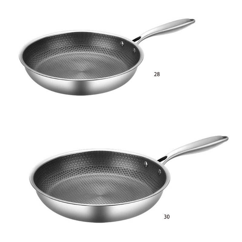Glänzende Edelstahlpfanne, kratzfest & induktionsgeeignet, für gesundes Kochen und perfekte Ergebnisse in Ihrer Küche.