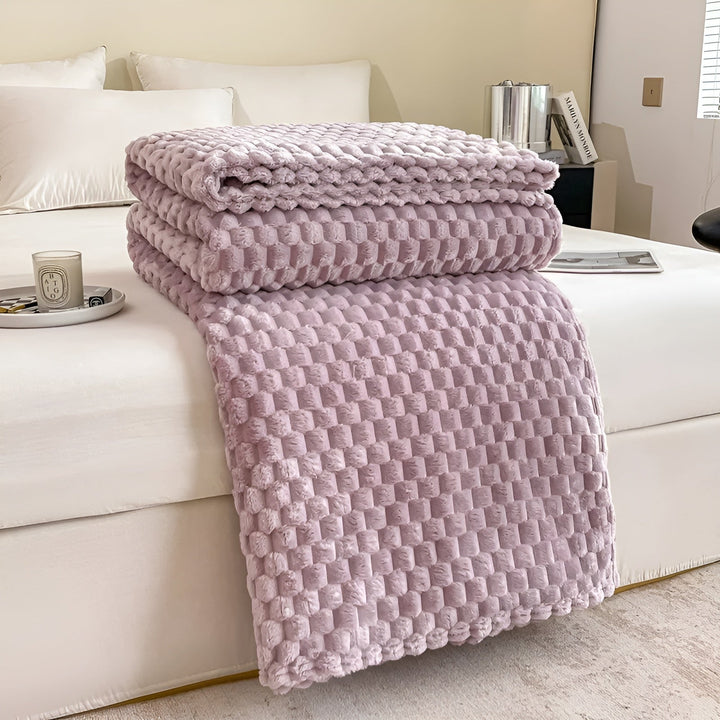 Vielseitige Kuscheldecke, superweich und warm, ideal als Tagesdecke oder Überwurf für Sofa und Bett.