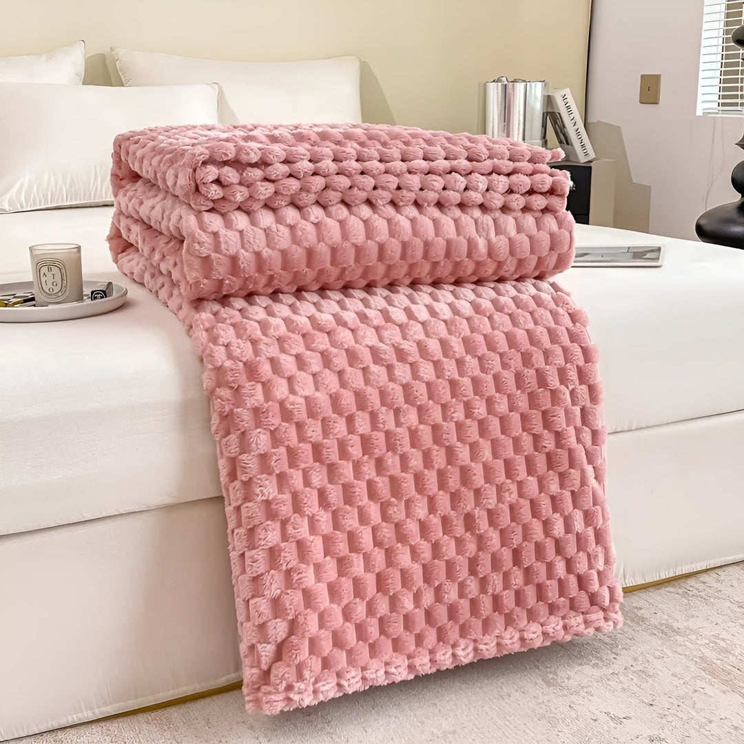 Moderne Kuscheldecke, superweich und warm, für ein stilvolles Wohnzimmer oder Schlafzimmer.