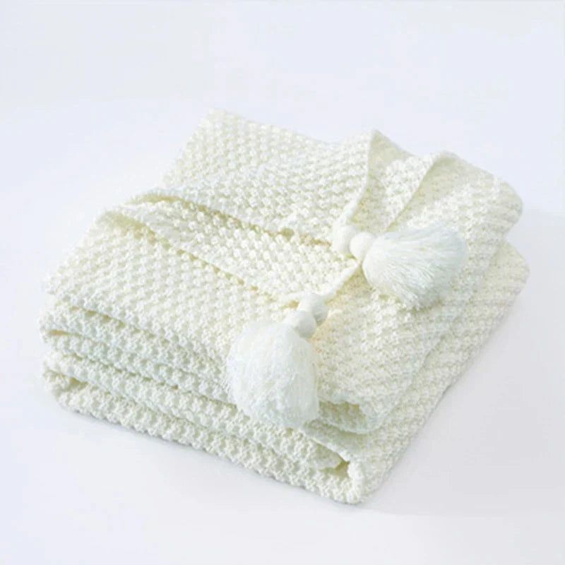 Gemütliche Kuscheldecke aus hochwertiger Wolle mit Quasten, perfekt für Sofa, Bett & Geschenk.