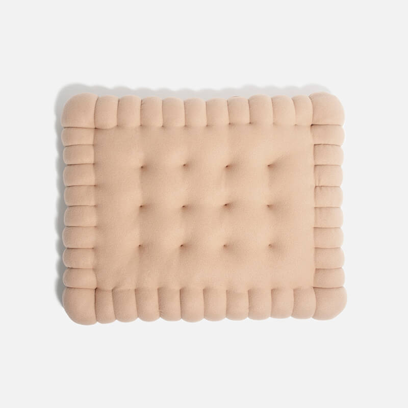 Stylisches Hundebett in Keksform, perfekt für kleine Rassen, bietet Halt & Wärme.