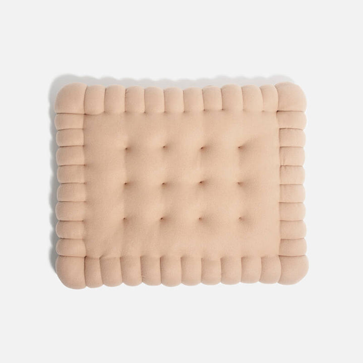 Stylisches Hundebett in Keksform, perfekt für kleine Rassen, bietet Halt & Wärme.