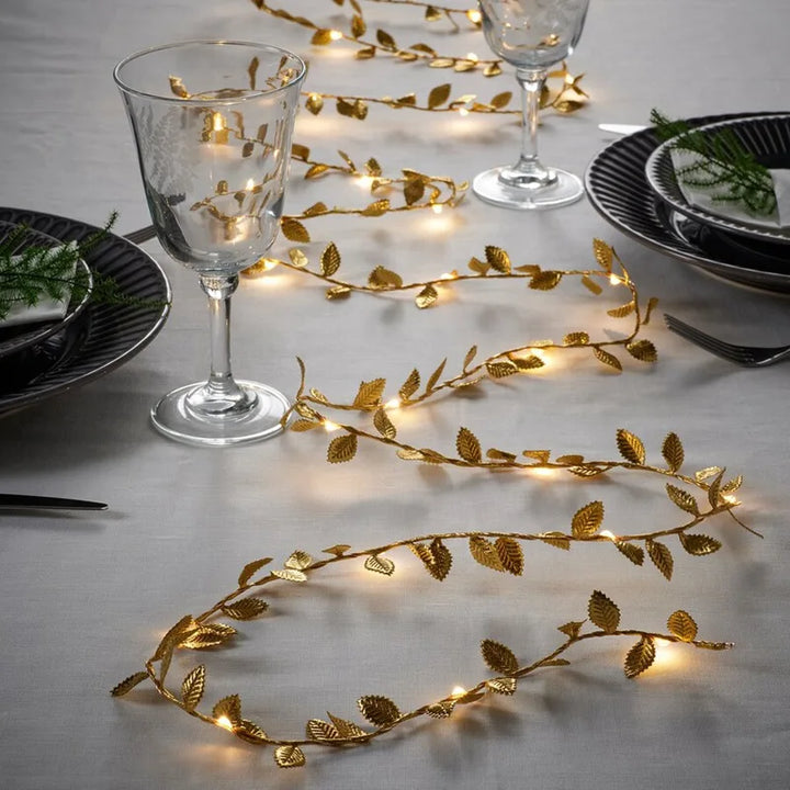Elegante Deko-Girlande: 2m LED Lichterkette goldene Blätter. Warmweißes Stimmungslicht für festliche Anlässe wie Hochzeit & Party.