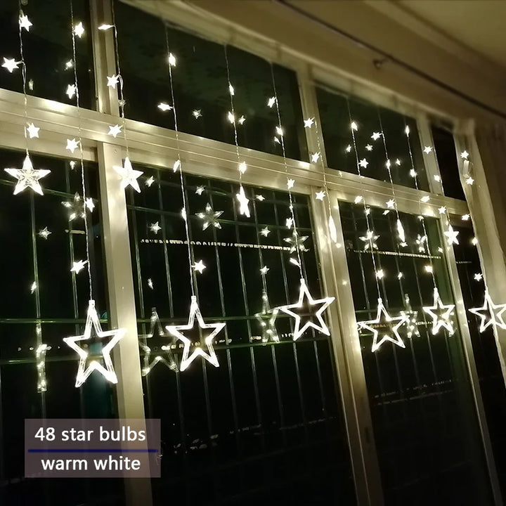 Bezaubernde LED-Vorhangbeleuchtung mit Sternen für Weihnacht, Hochzeit oder Gartenpartys.
