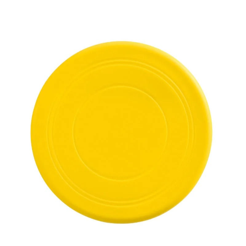 Robuste Silikon-Frisbee für Hunde, perfekt für aktive Apportierspiele im Garten und Park.