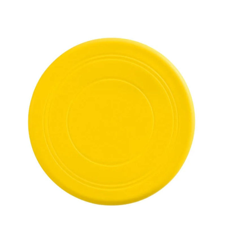 Robuste Silikon-Frisbee für Hunde, perfekt für aktive Apportierspiele im Garten und Park.