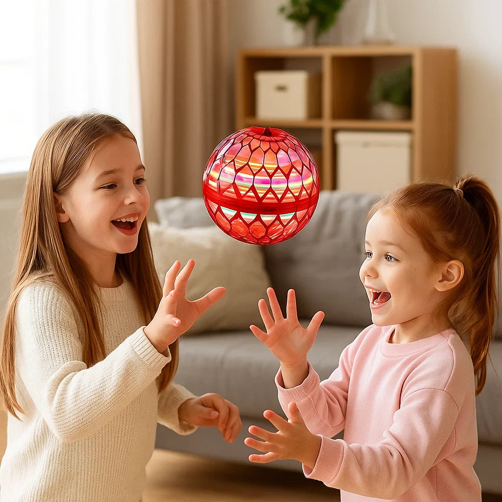 Action-Bild: Schwebender Spielball mit leuchtenden LEDs in der Luft, interaktives Vergnügen für alle.