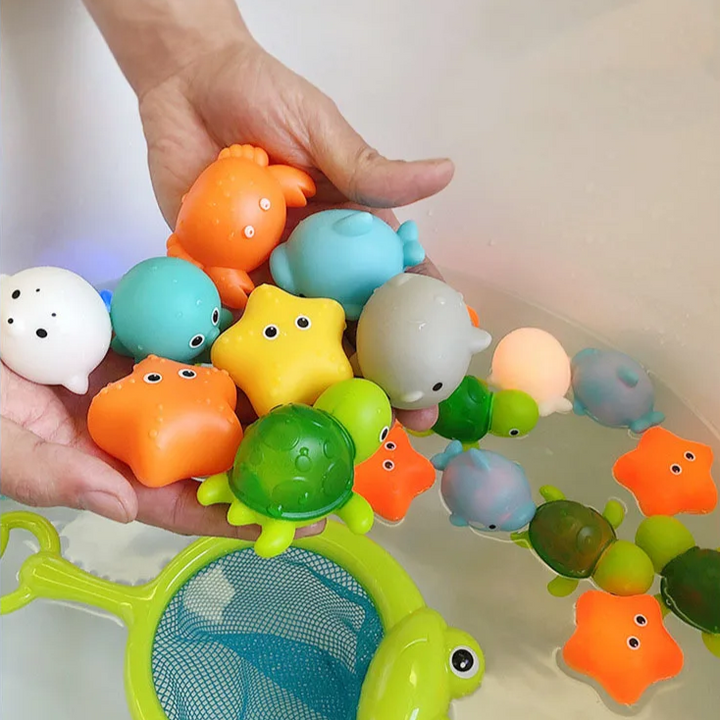 Badespielzeug-Set 'Theodore' für Kinder, leuchtende Badefreunde für Entwicklung und großen Badespaß.