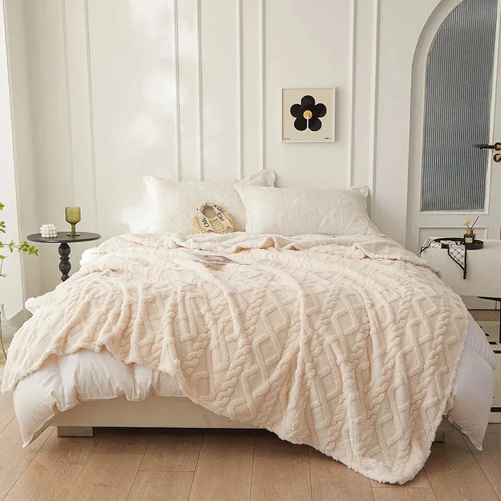 Warme Winterdecke CozyLuxe aus Lammwolle, doppelseitig und besonders gemütlich.