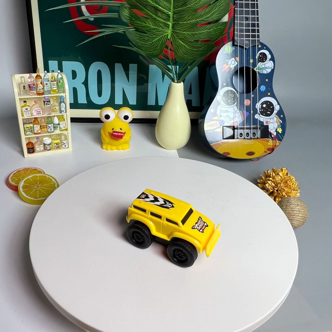 Einzigartiger vertikaler Spielspaß: Kinder steuern ihre magnetischen Wandkletterautos am Limit.