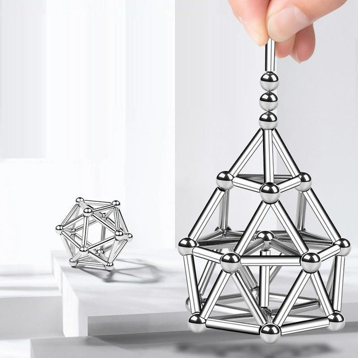 Bunte Magnetstäbe & Kugeln: Vielseitiges Spielzeug für unzählige 2D- & 3D-Modelle, ideal zur Förderung der Fantasie.
