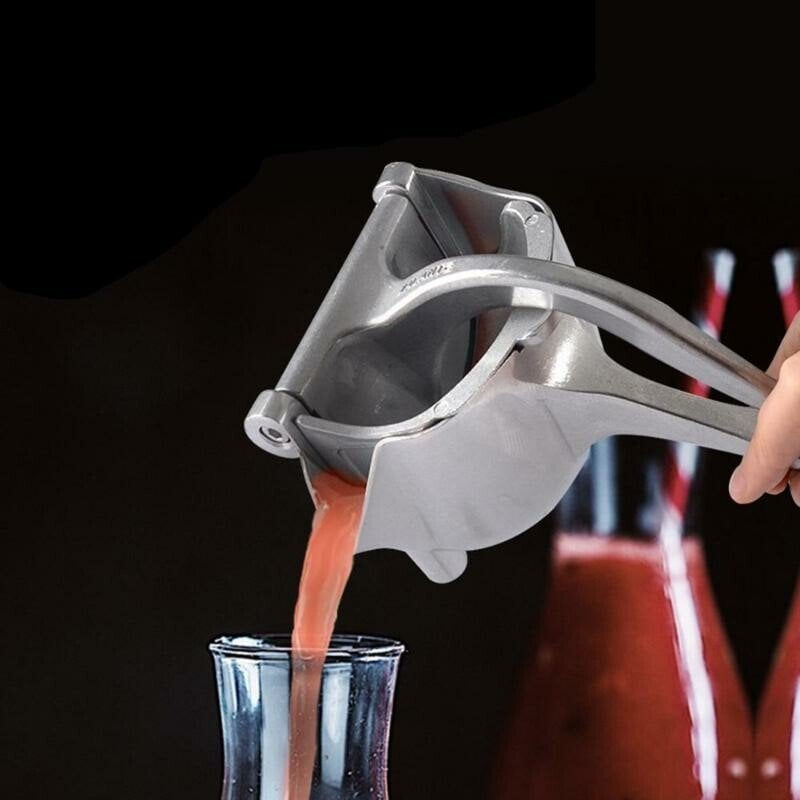 Hochwertiger manueller Entsafter aus Aluminium für gesunden Frischsaft. Ergonomischer Küchenhelfer, rostfrei.
