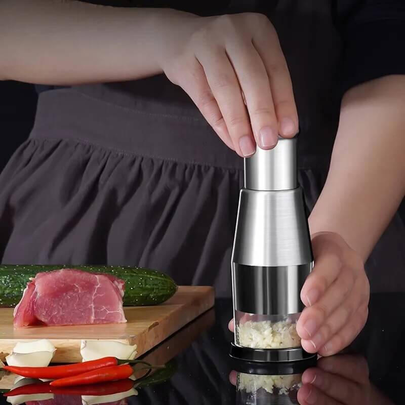Edelstahl Gemüseschneider, leicht zu reinigen, perfekt für Zwiebeln, Knoblauch und Gemüse.