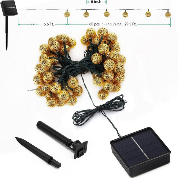Stimmungsvolle SunGlow Solar-Lichterkette im marokkanischen Stil, wasserdicht für gemütliche Abende im Garten.