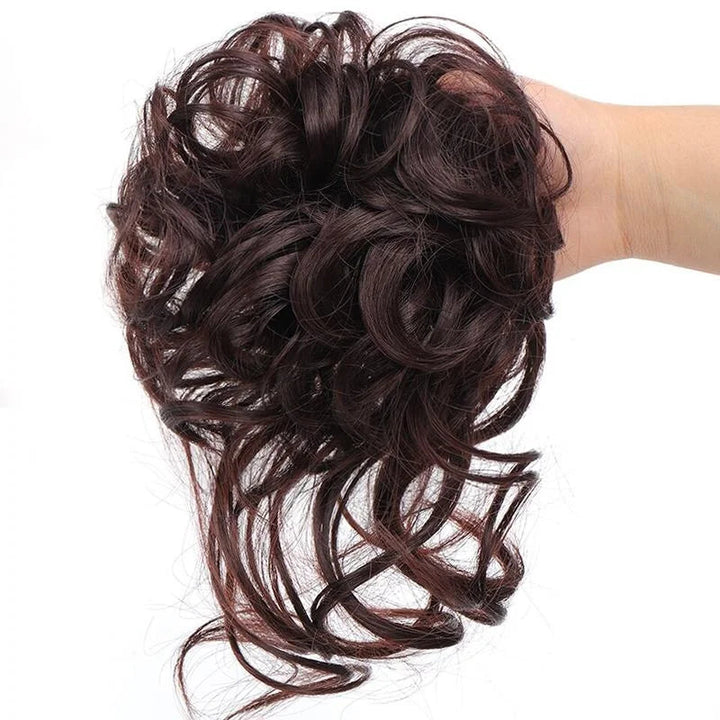 Natürliches Dutt Haarteil, perfekt für voluminöse Hochsteckfrisuren.