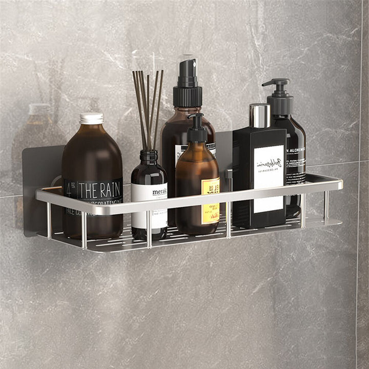 Praktisches Saugnapfregal aus Metall zur Badaufbewahrung von Shampoo, Seife und Duschgel.