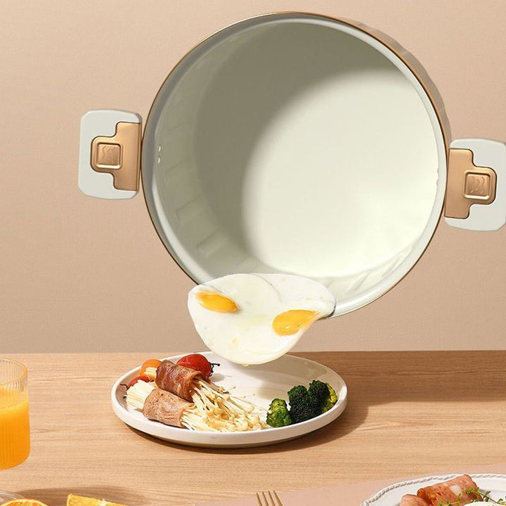 Mikro-Kochtopf mit Druckfunktion und Antihaft-Eigenschaft, ideal für vielseitiges Kochen in jeder modernen Küche.