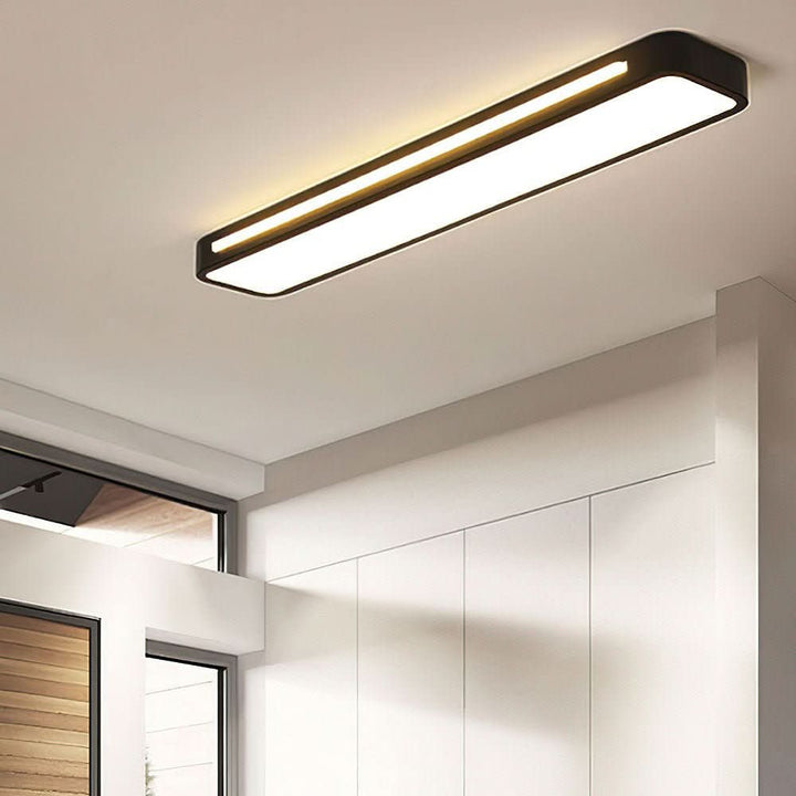 Formschöne LED Deckenlampe, minimalistisch, moderne Beleuchtung für Wohnräume.