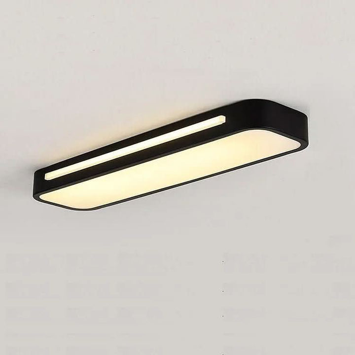 Harmonische LED Deckenlampe, minimalistisch, energiesparend für jedes Zimmer.