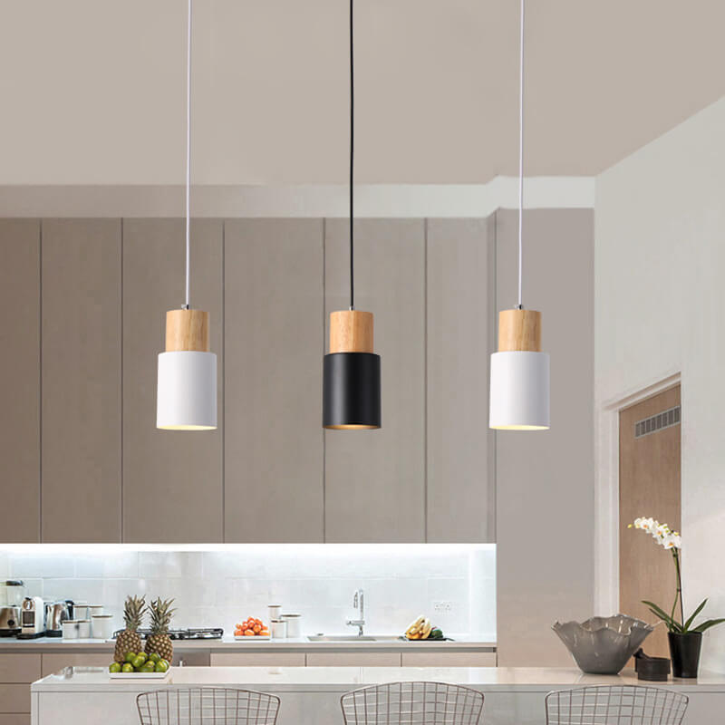 Sanfte LED-Hängeleuchte im Zylinderdesign, schafft ruhiges Ambiente im modernen Schlafzimmer.