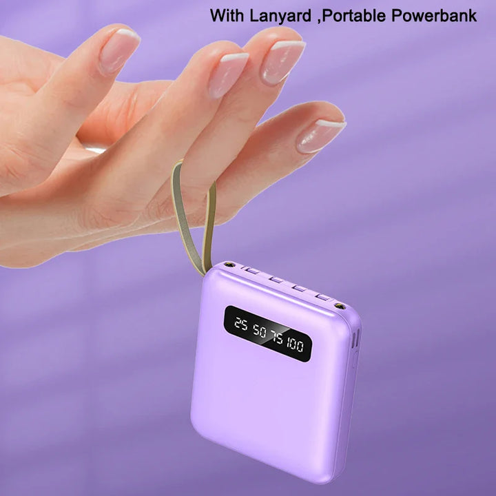 Smartphone Zubehör: Mobile 20.000mAh Powerbank mit Spiegel-Display & integrierten USB-C, Lightning, Micro-USB Kabeln.