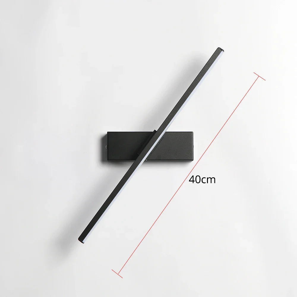 Schwenkbare AuroLite LED-Wandleuchte für flexible Innenbeleuchtung, ideal als Leseleuchte oder Akzentbeleuchtung.