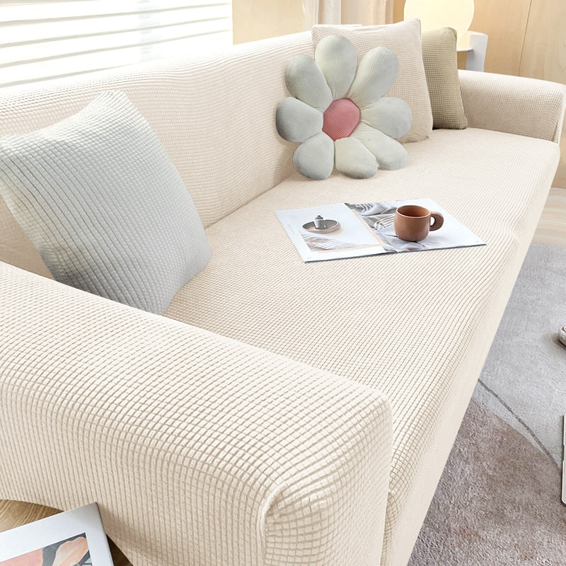 Moderne dehnbare Sofahusse in Grau, elastisch & rutschfest, idealer Möbelschutz für Ihr Wohnzimmer.
