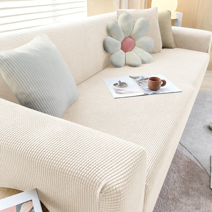 Moderne dehnbare Sofahusse in Grau, elastisch & rutschfest, idealer Möbelschutz für Ihr Wohnzimmer.