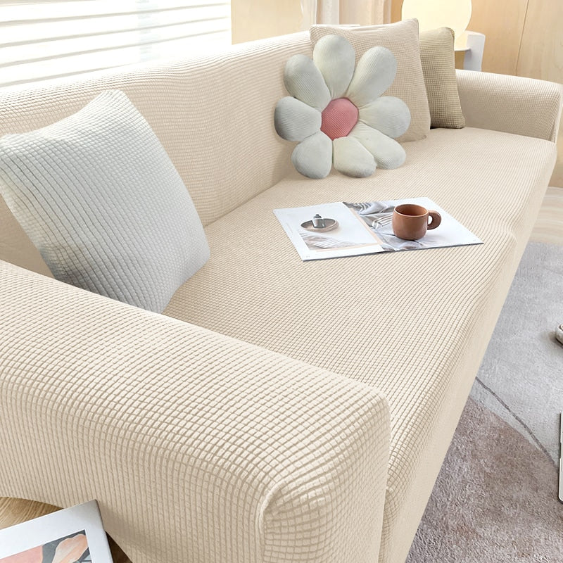 Trendige Sofahusse, elastisch, in Grün, stilvoller Möbelschutz, modernisiert Ihr Interieur sofort.