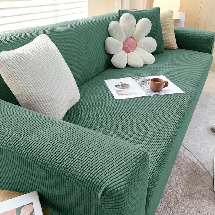 Robuste Sofahusse, dehnbar, tiersicher & familienfreundlich, ideal für den täglichen Gebrauch.