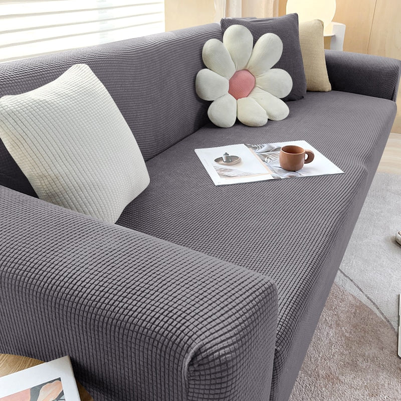 Stilvolle Stretchhusse für Sofa, farbenfroh, schützt Polster vor Tieren & Kindern, pflegeleicht.