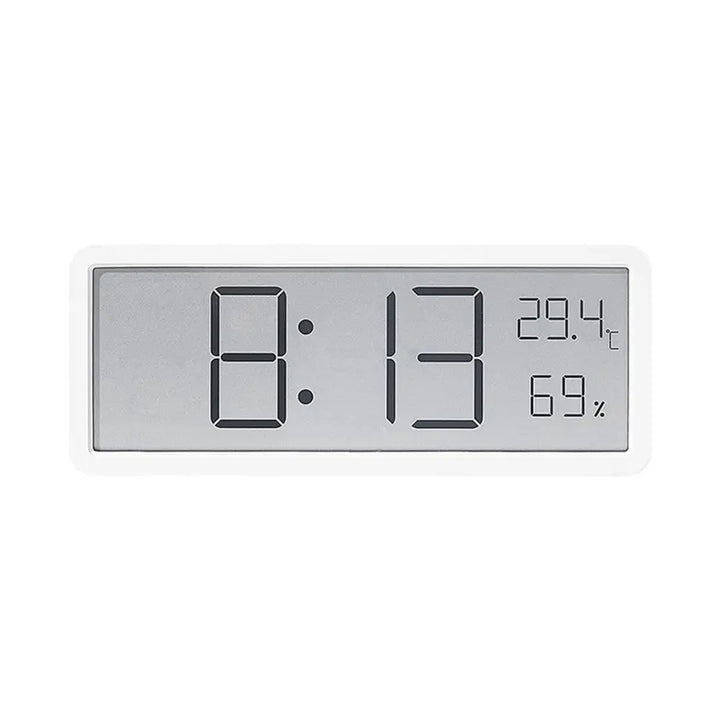 Geräuschlose digitale Wanduhr TimeGlow. Zeigt Zeit, Temperatur, Luftfeuchtigkeit mit großen, gut lesbaren Ziffern.